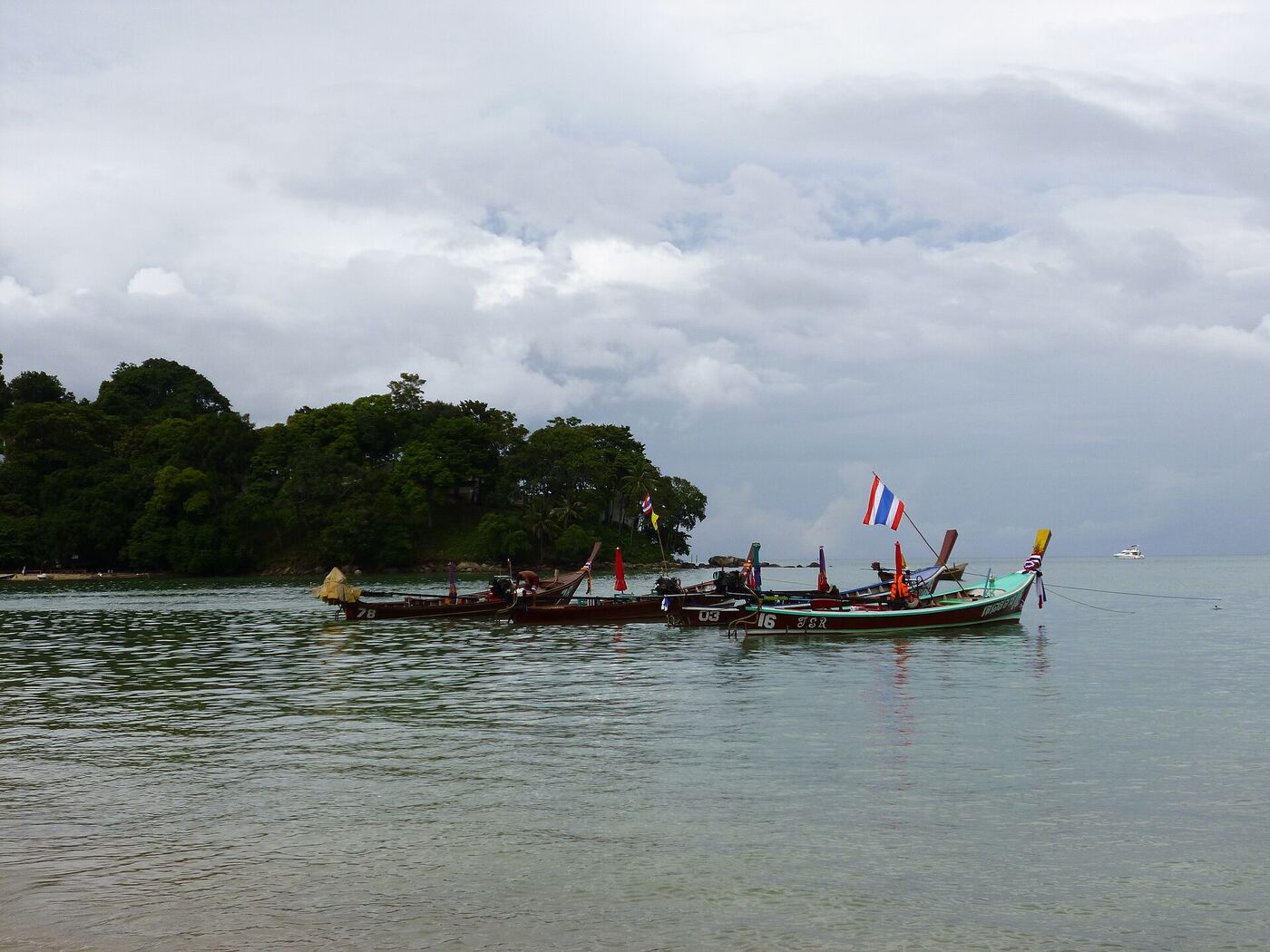 Long-tail boats on the beach at Phuket