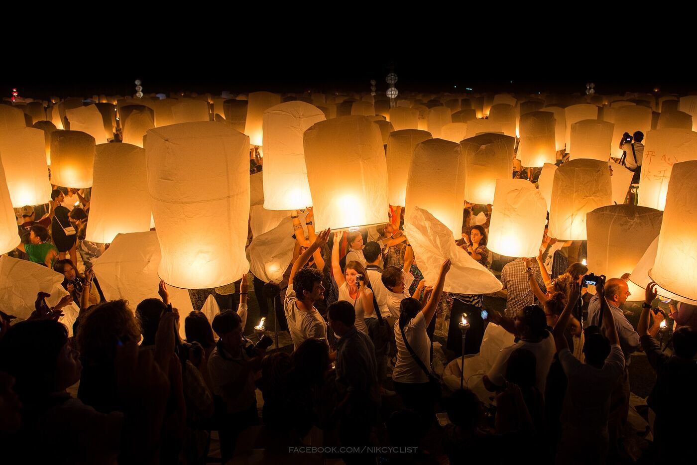 Hundreds of paper sky lanterns released at night, Yi Peng, Chiang Mai